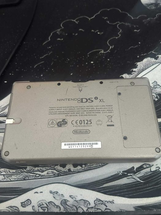 Nintendo DSi XL Bronz with charger and pen