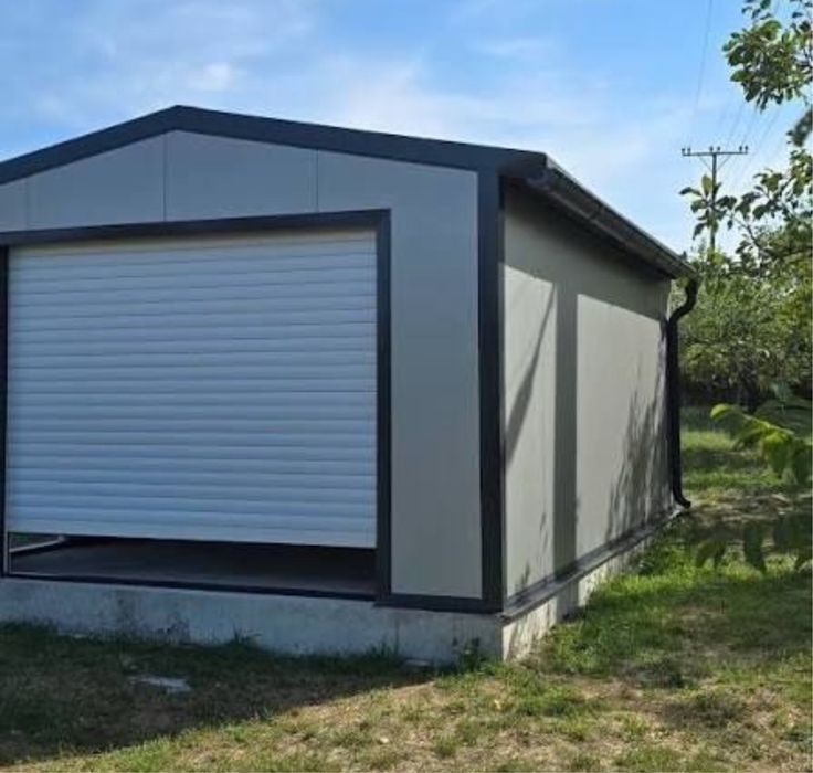 Realizam garaj din structura metalica invelit cu panouri sandwich