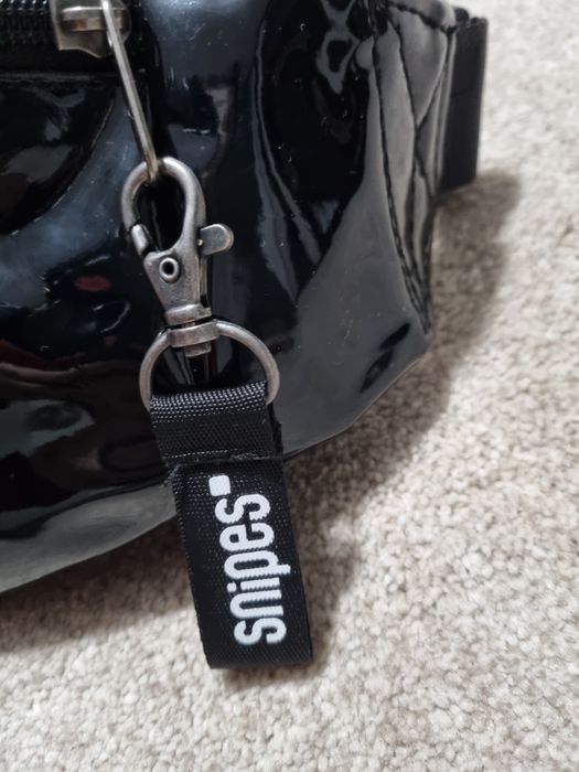 Borseta de la Snipes