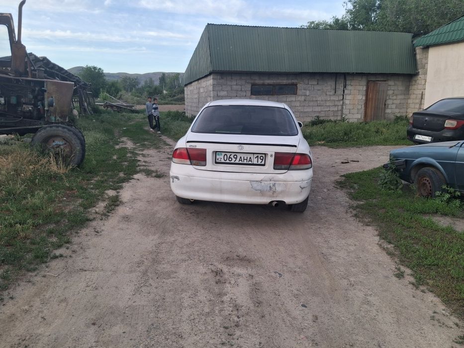 Машина мазда кронос