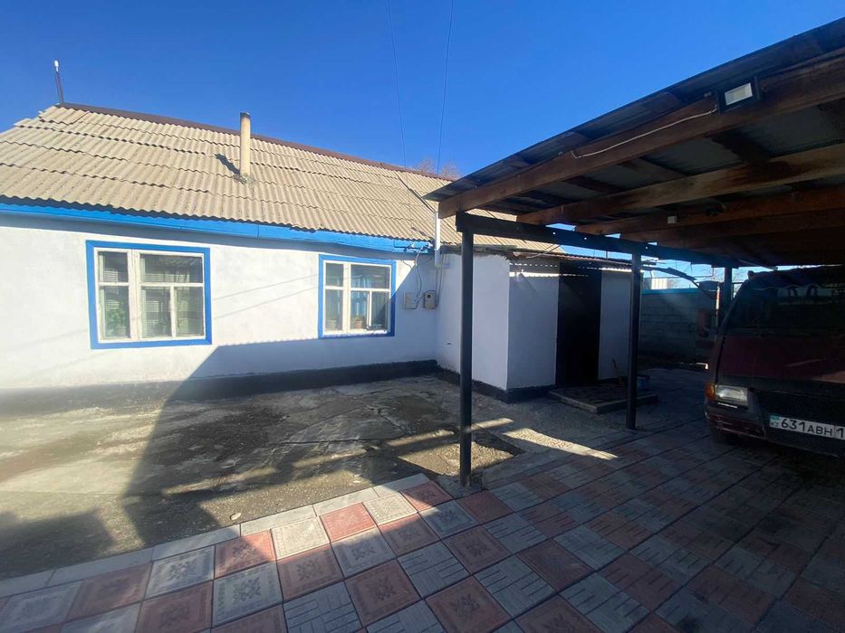 Дом на Бугре, Танат Империя