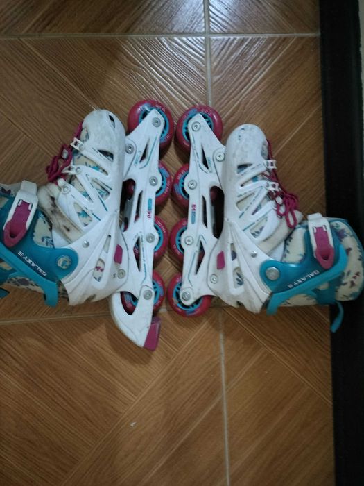 Коньки роликовые