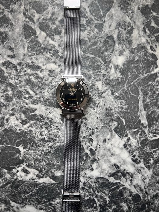 Часовници Omega и Rolex