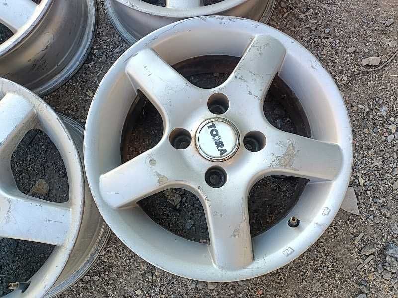 Продам оригинальные легкосплавные диски на Пежо