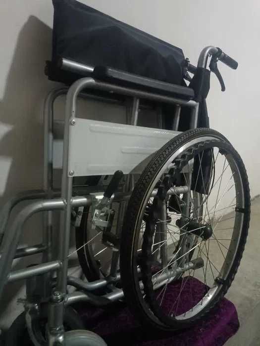 г.  Инвалидный коляска 75