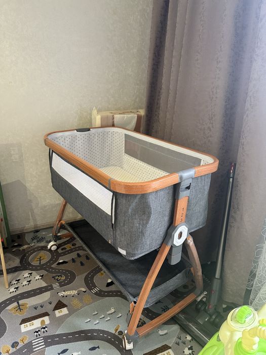 Манеж на колесиках