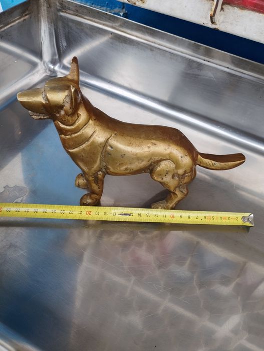 Бронзова статуя Куче