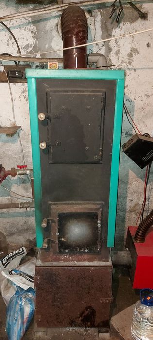 Котел с горелка на пелети.