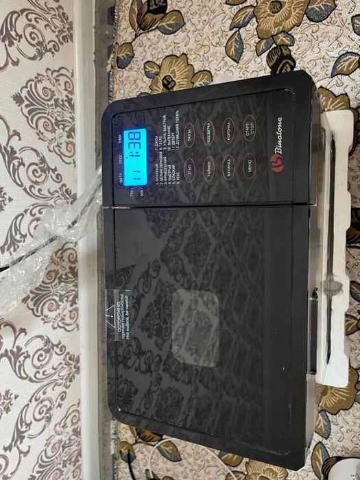 Хлебопечь продам Binotone