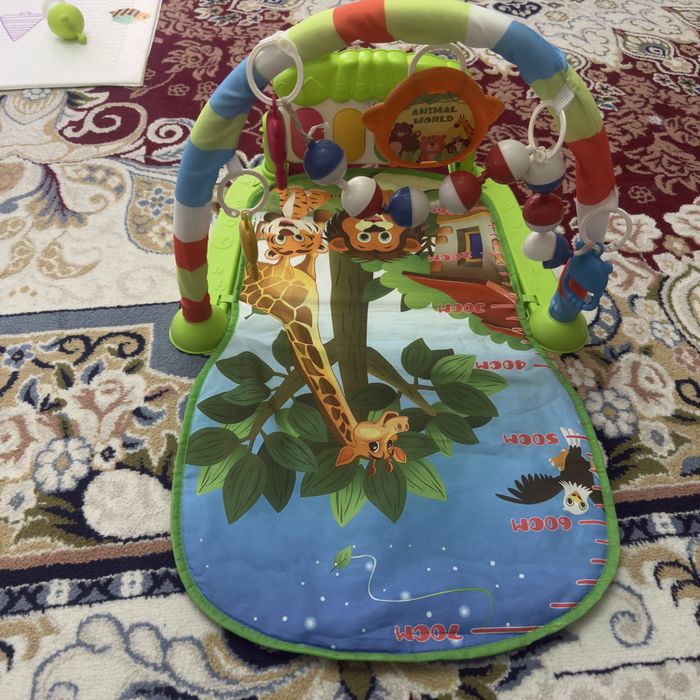 Продам развивающий коврик с пианино