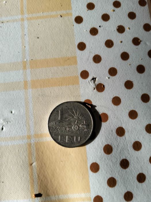 Vând moneda de 1 leu