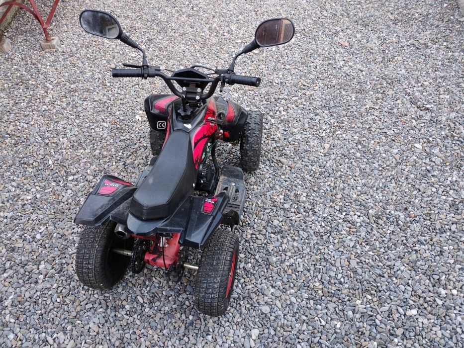Atv-u 49cc pentru copii 7-12ani