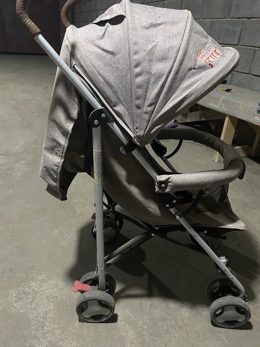 Детская коляска , серого цвета
