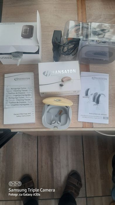 Aparat auditiv Hansaton 7HD cu reglaje.