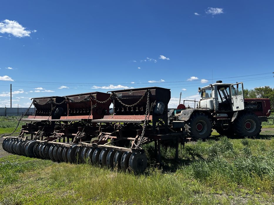 Т - 150  ХТЗ трактор с сеялками