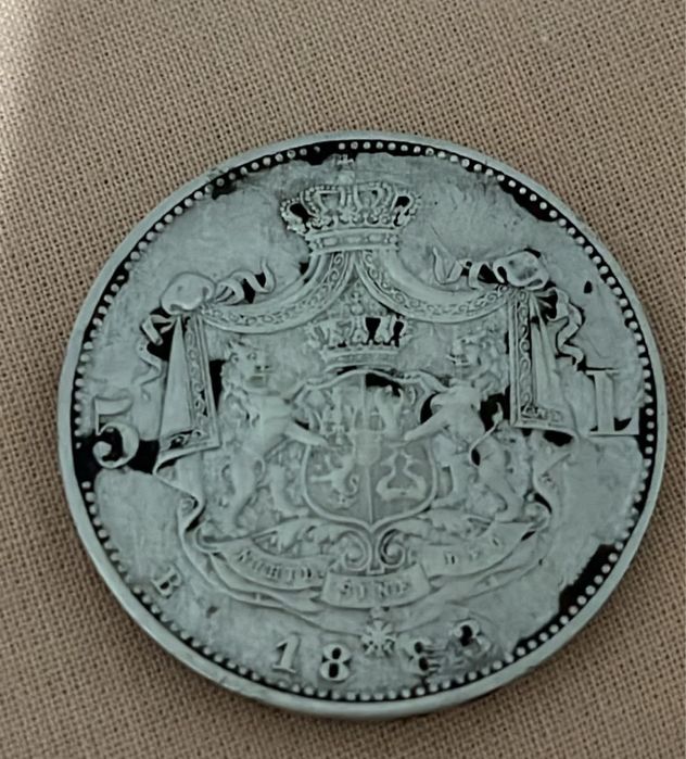 Vand moneda de argint