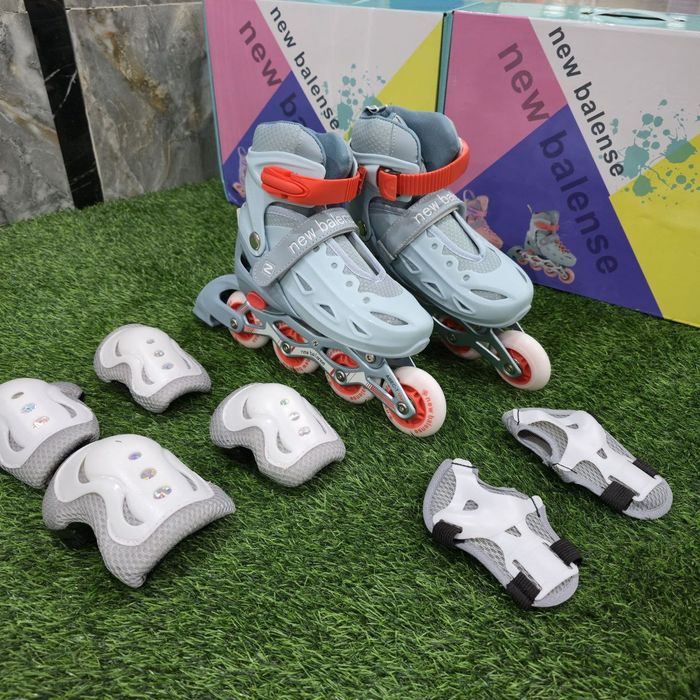 Роликовые коньки