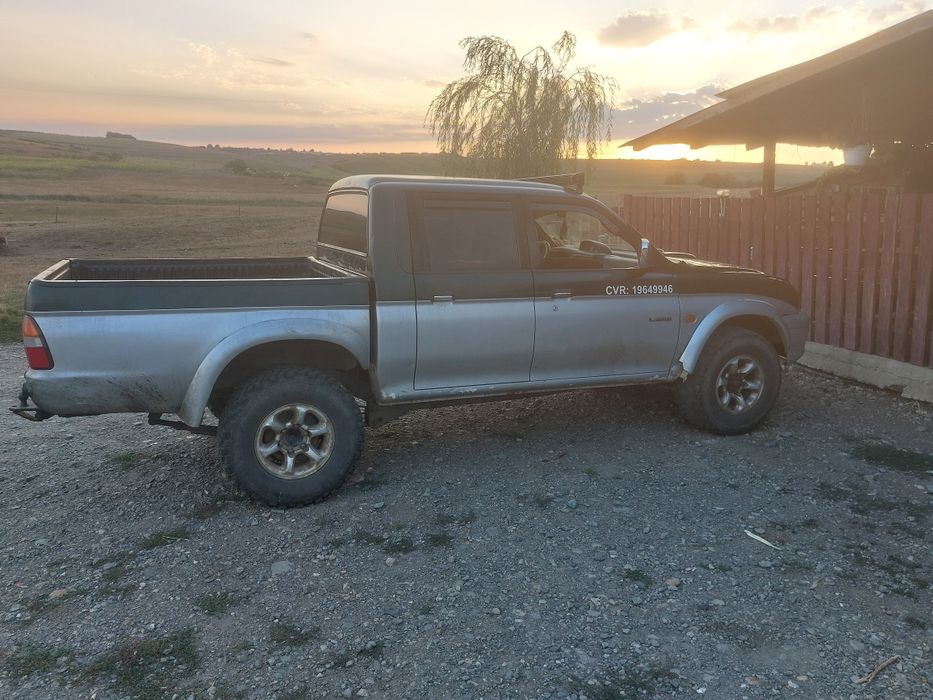 Mitubisi l 200 patru  ori patru