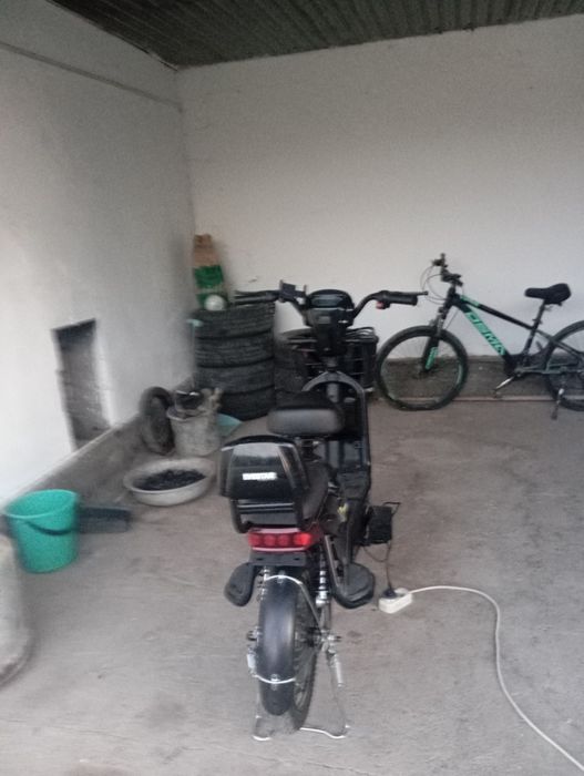 Скутер на тараза