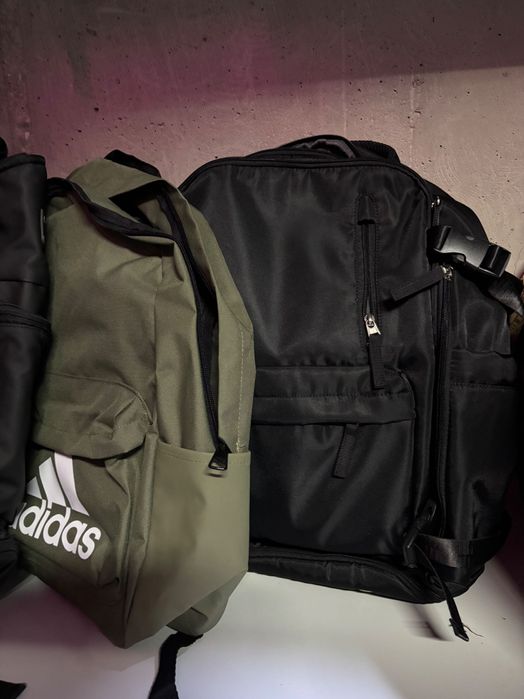 Рюкзаки и дорожные су