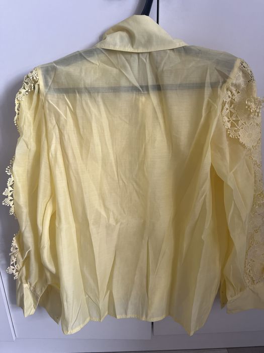 Продам блузку желтого цвета