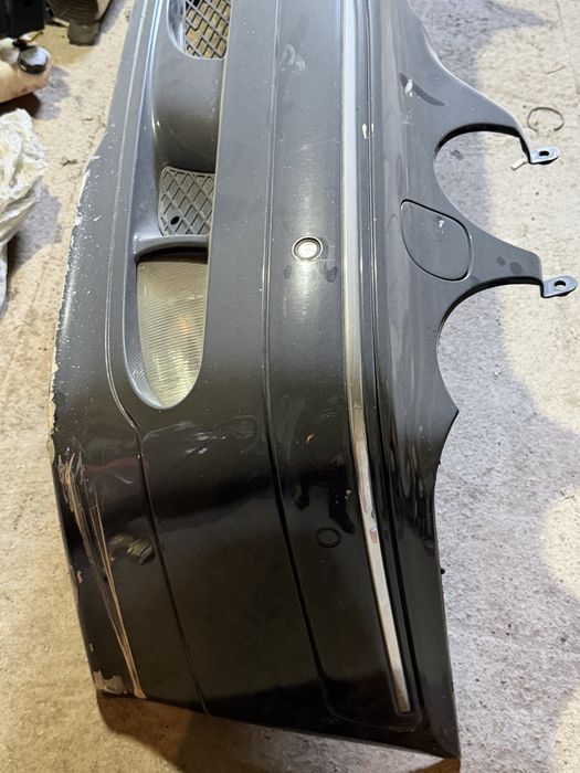 Передний бампер на лупарик W210