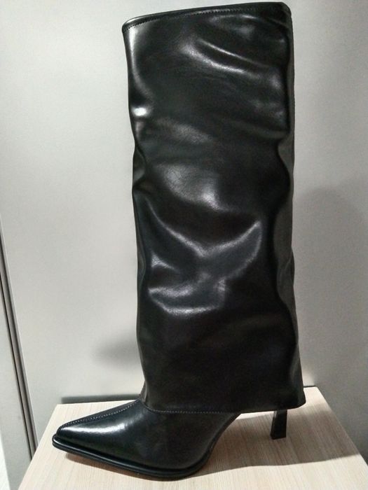 Продается новые сапоги