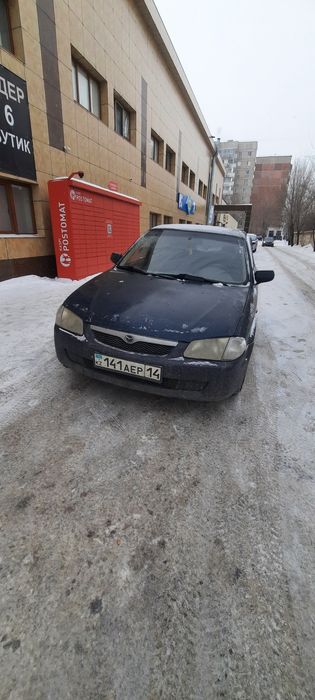 Мазда 323bj 1999 года