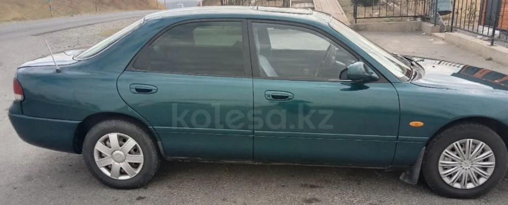 Мазда кронос 1994г.в по запчастям