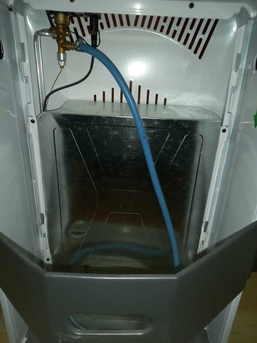 Soba pe gaz, nouă  nefolosită.