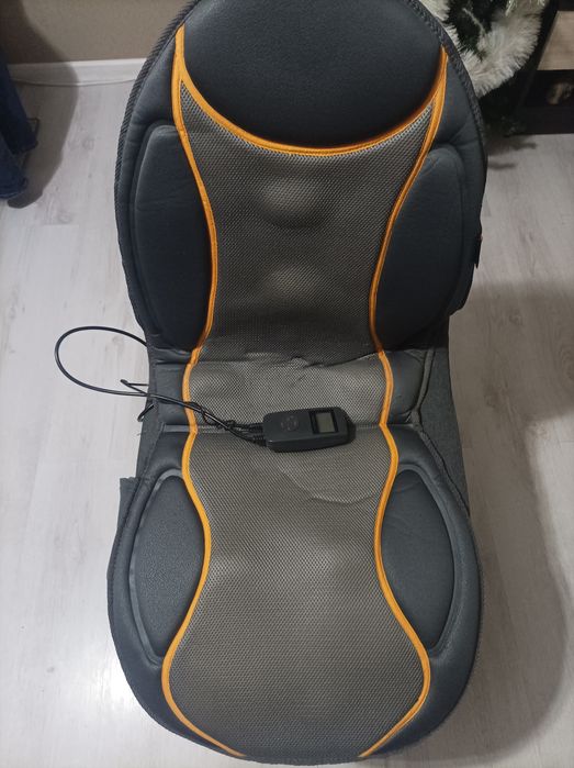 Масажираща седалка , затопляща функция, четири нива на интензивност.