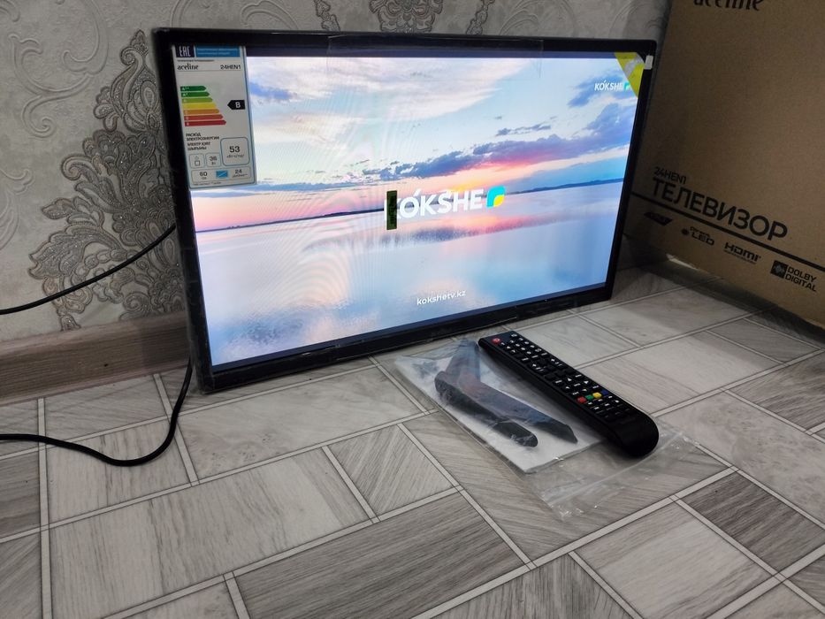 телевизор led 60 см / новый