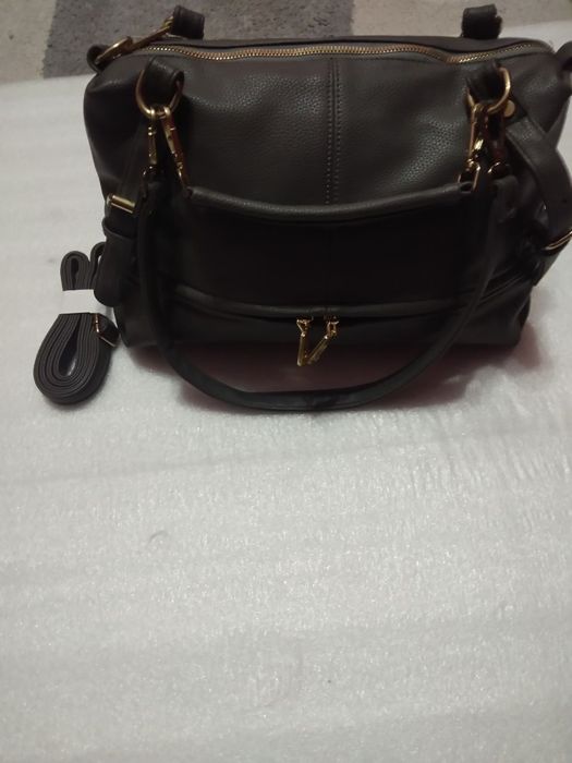 Новая сумка очень красивая большая чистая кожа