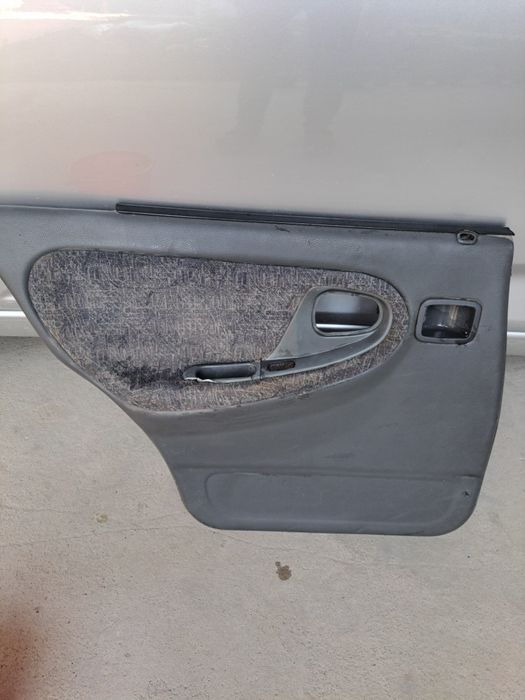 Чехол  нексия 1 завод орка эшик обшивкаси