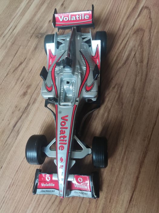 мотопед-макет и състезателна кола