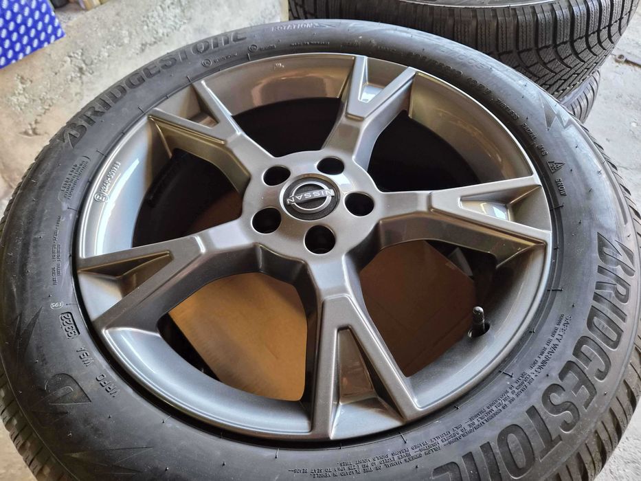 NISSAN ARIYA оригинални нови джанти 19" в комплект със зимни гуми 235/55/R19 Bridgestone Blizzak XL
