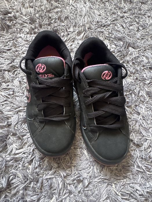 Продам 1 колесные кроссовки ролики черные на девочку