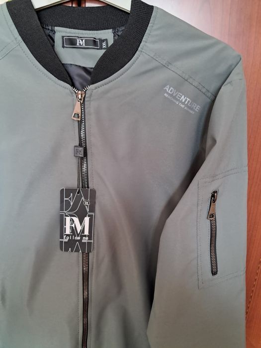 Продам ветровку новую