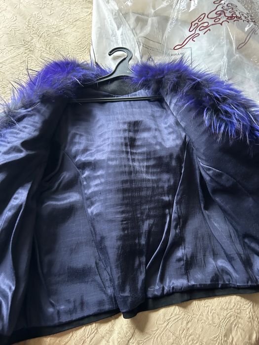 Жилетки кожанные