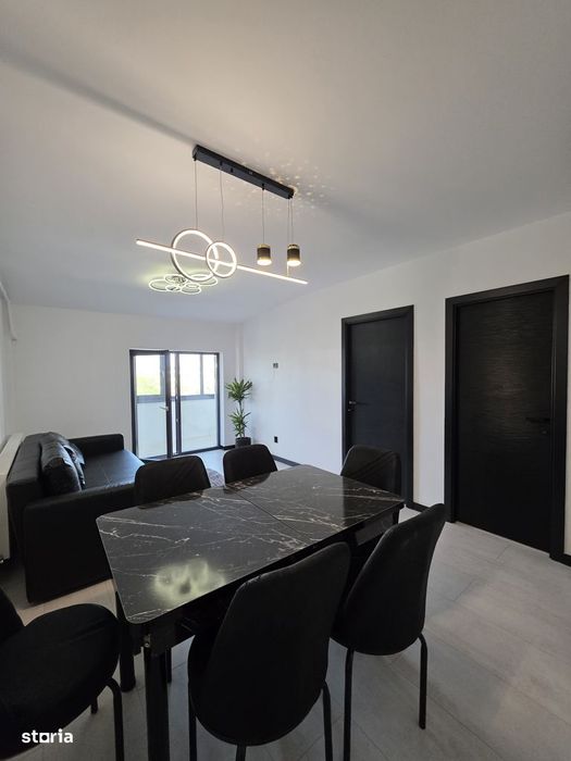 Apartament bloc nou,parcare proprie, mobilat.