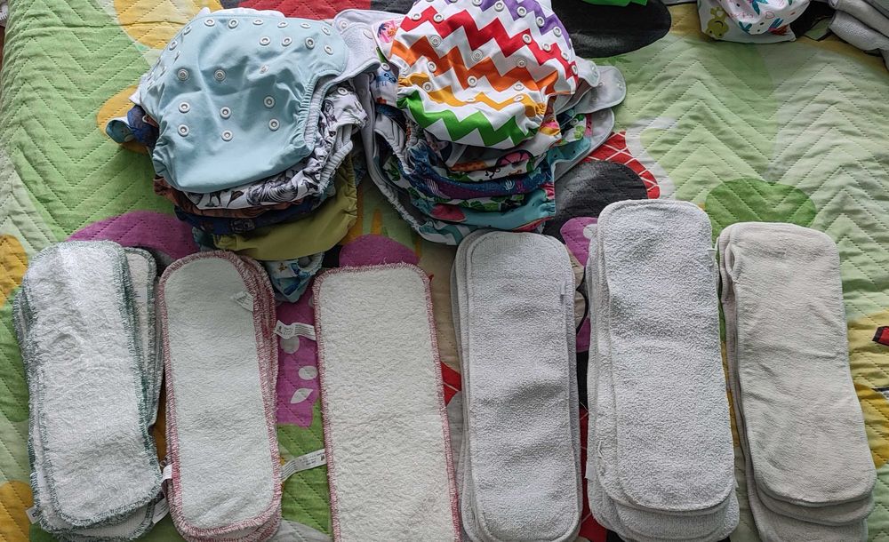 Огромен сет 22 пелени/памперси за многократна употреба и 53 подложки