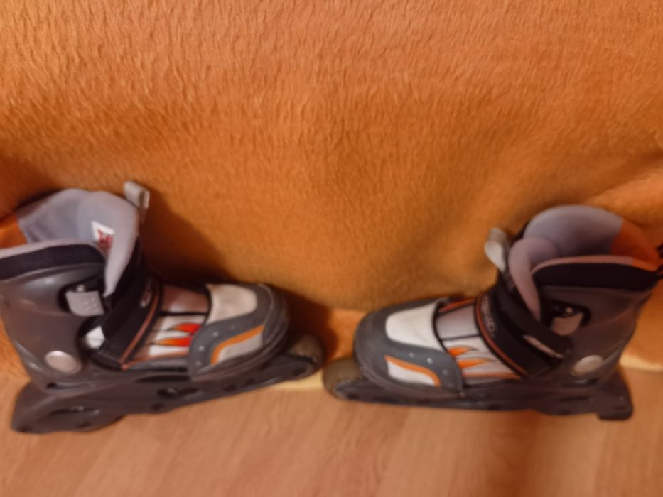 Role / patine reglabile 31-33