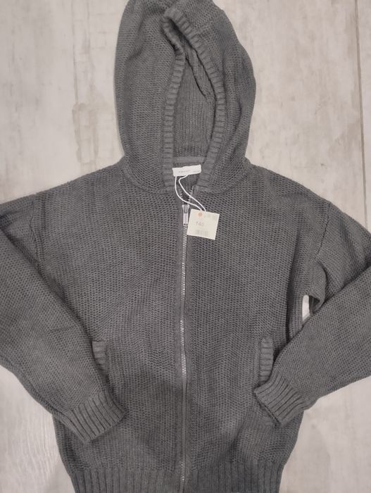 Нова плетена жилетка