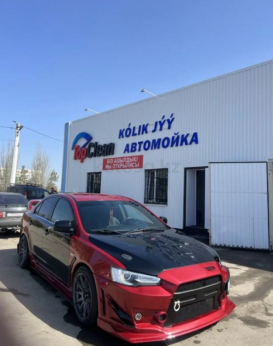 Митсубиси лансер 2010 года