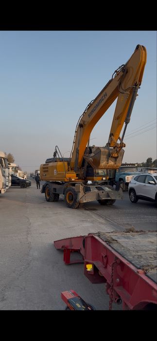 синомач колёсный экскаватор 215