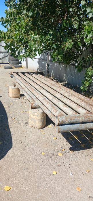 Продам трубы и гаражные ворота.