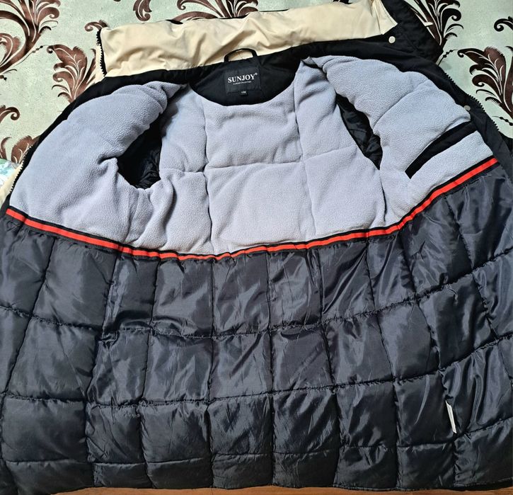 Продам женский пуховик