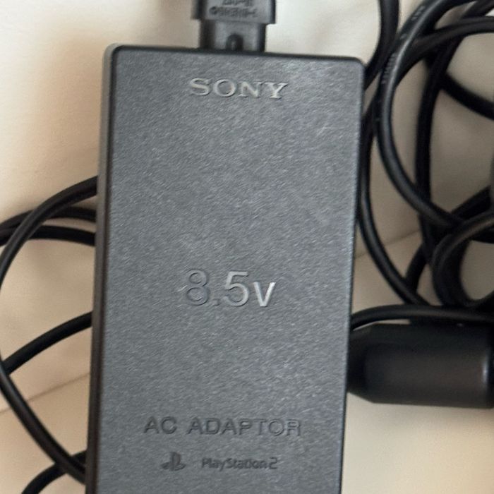 PlayStation 2 slim чипованная и 2 джостика