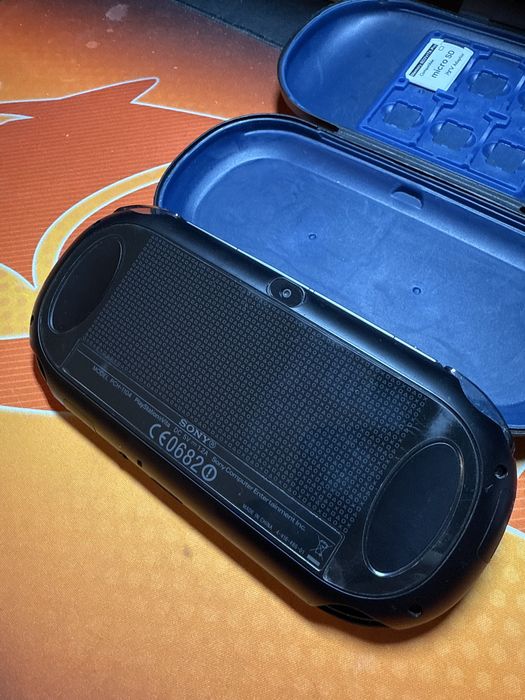 Ps Vita 1104 OLED 16GB, 7 игри, калъф, зарядно и адаптер за карта памет