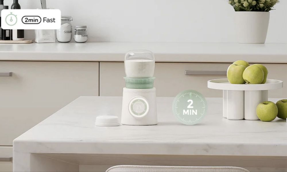 Нагревател за бебешки шишета Momcozy.